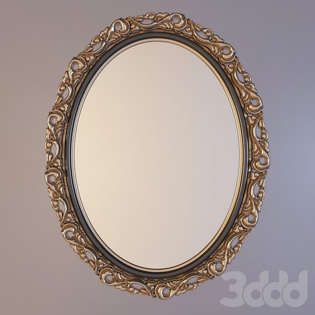 oval mirror in a carved frame