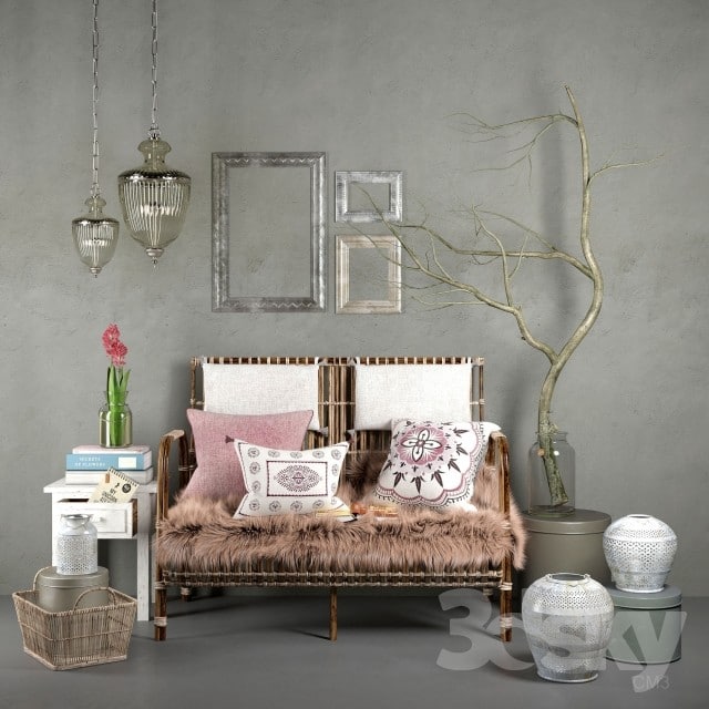 A living room with a couch, a lamp, and a vase