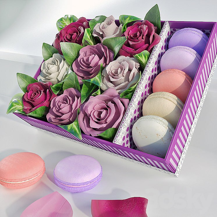 Box with roses and makarons
