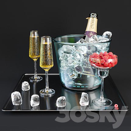 A bottle of champagne on a tray with ice and raspberries.