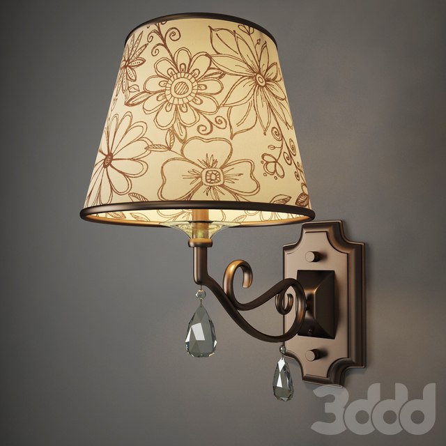 A wall lamp with a shade and a crystal